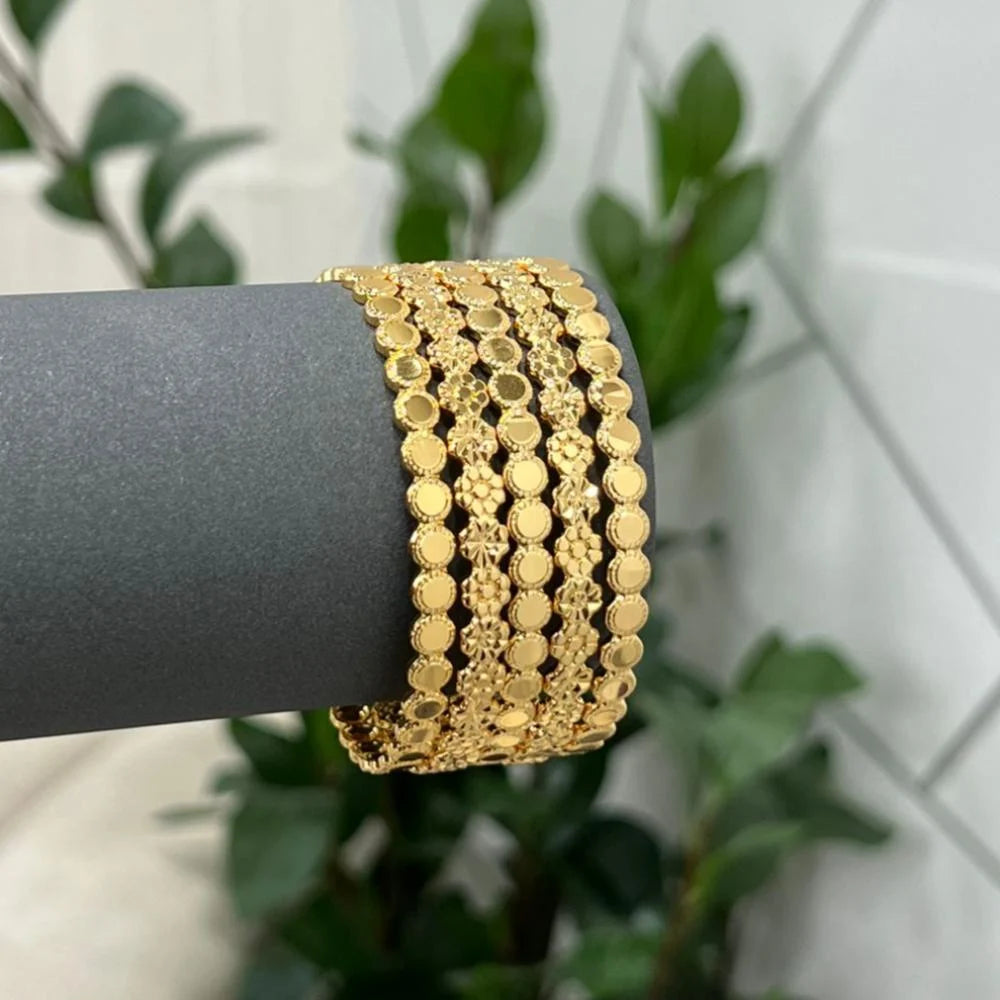 5 Rose bangles with a gold drill