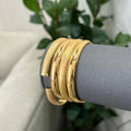 4 plain bangles with a gold-plated key