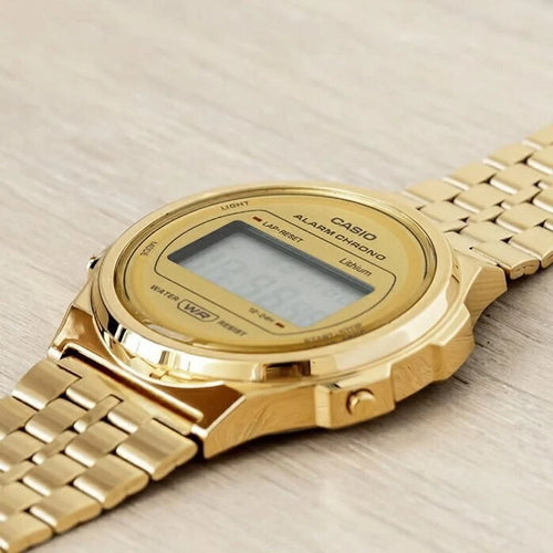 A CASIO COUPLE VINTAGE UNISEX ROUND BRACELET IN GOLD AND SILVER